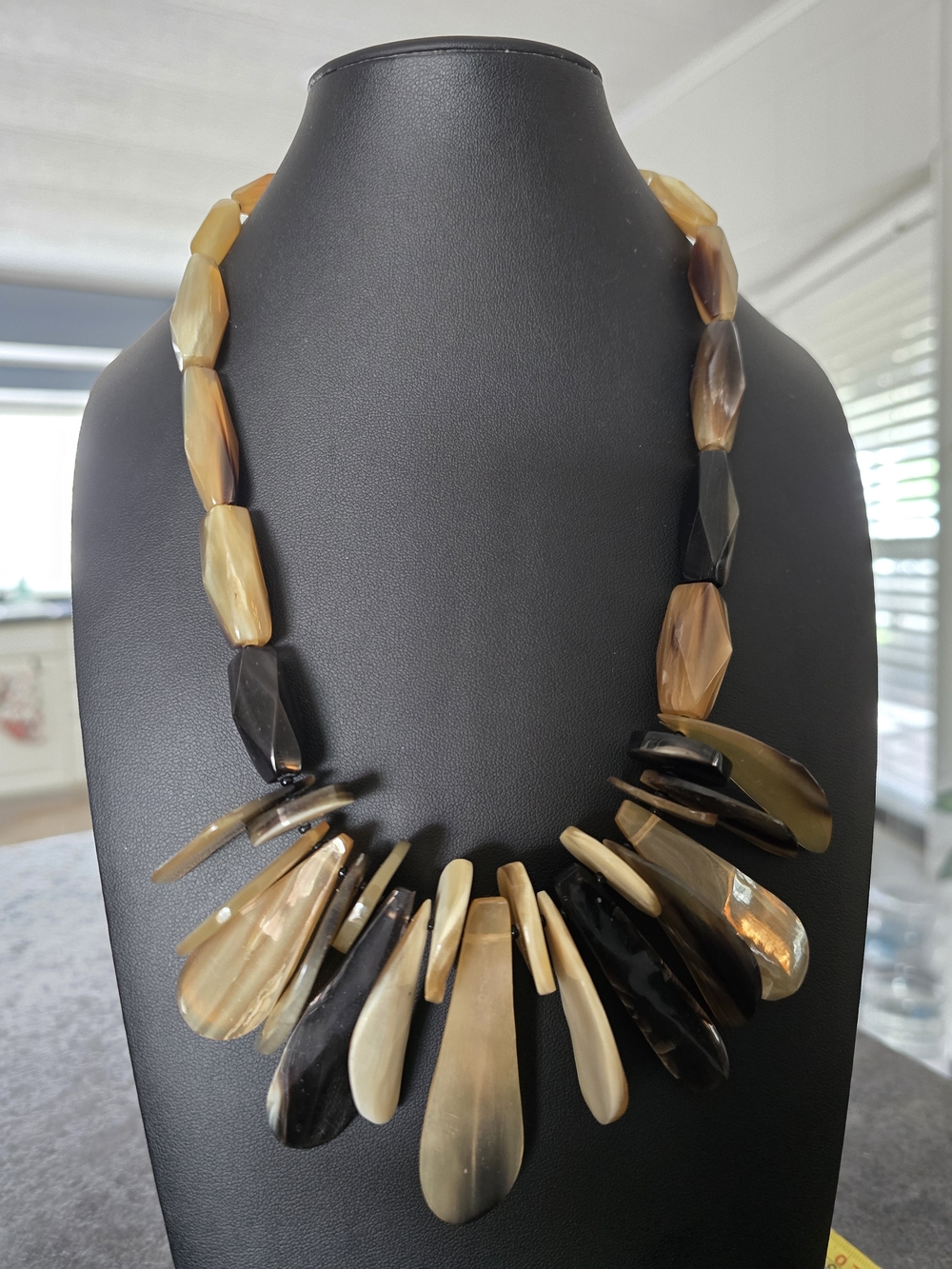 Statement Horn-Effect Pendant Necklace in Black and Tan -